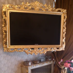 Marco TV tallado y dorado a la hoja rebatible